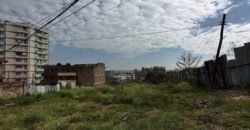 This exceptional 0.29-acre parcel, strategically located behind Warren in Kasarani.