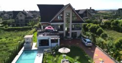 Magnificent 6-Bedroom Home on 1/4 Acre.