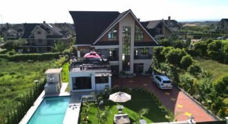 Magnificent 6-Bedroom Home on 1/4 Acre.