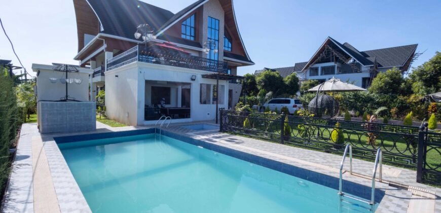 Magnificent 6-Bedroom Home on 1/4 Acre.